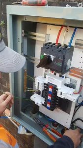 Electrician doing electrical work