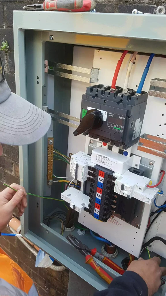Electrician doing electrical work
